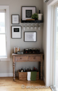 creating a farmhouse inspired wine nook, creating a wine nook, farmhouse inspired, farmhouse decor, wine nook, wine, wine corner, wine bottles, wine glasses, quote decor, sayings decor, DIY art, wine crafts, cork crafts